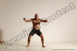 Underwear Gymnastic poses Man Black Muscular Bald Dancing Dynamic poses Academic